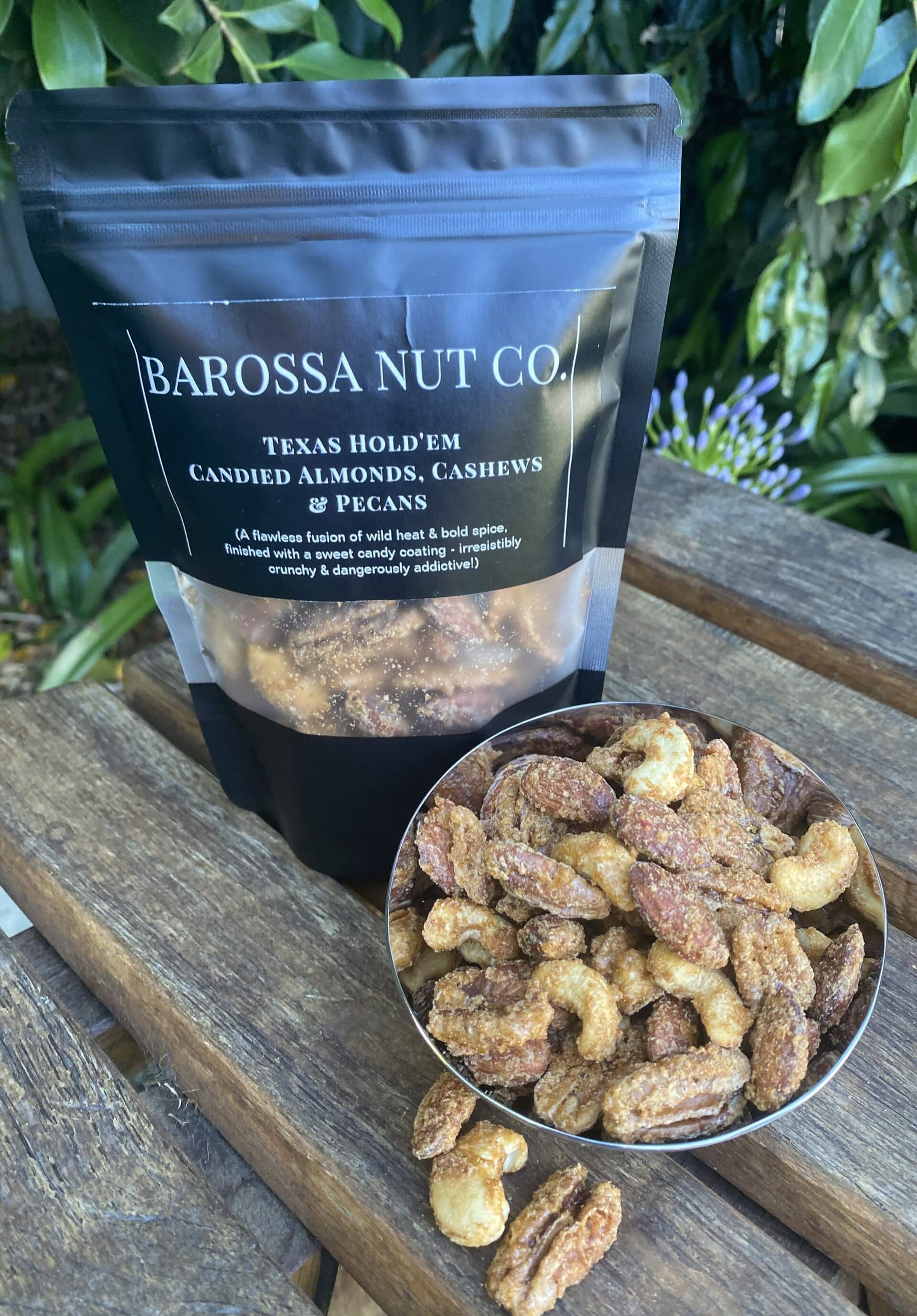 Texas Hold'em candied almonds, pecans and cashews in premium black packaging from Barossa Nut Co.